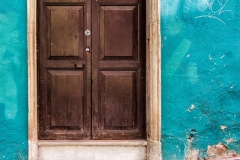 Cat In Front Of Door